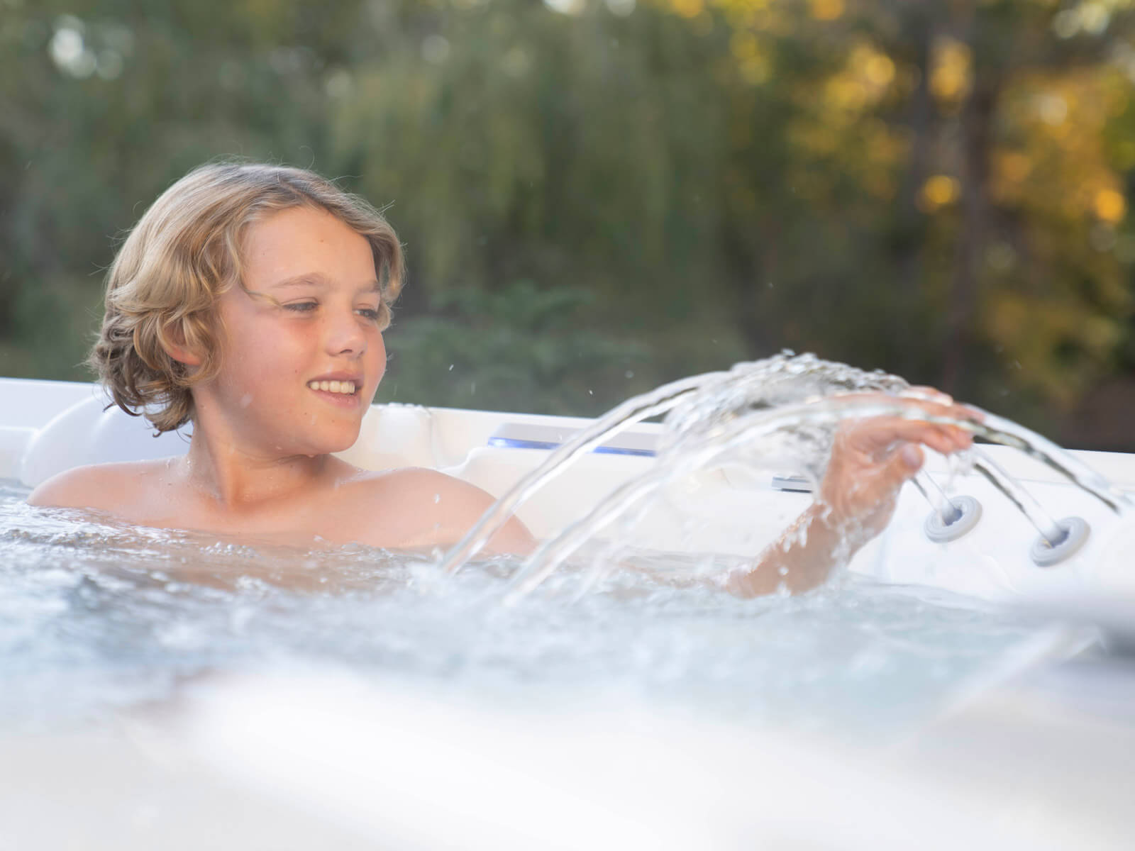 Grandee Hot Spring Spas HighLife® Collection backyard fun