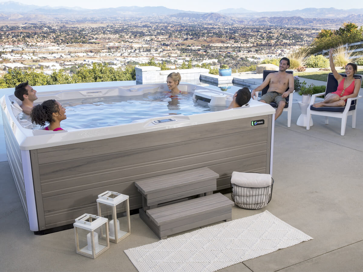 Prism Hot Spring Spas' Limelight® Collection backyard